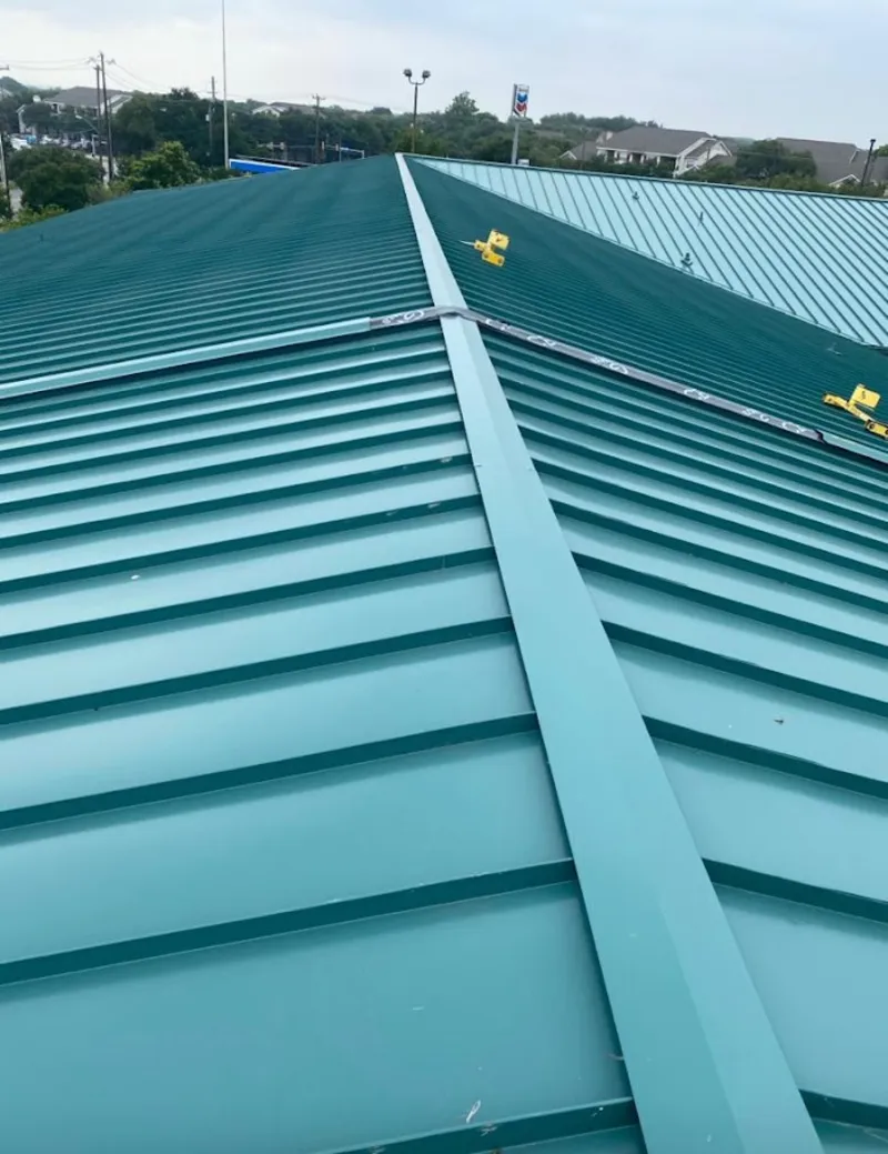 Green commercial metal roof ridge and valley for Metal Roof Repair in Stroud